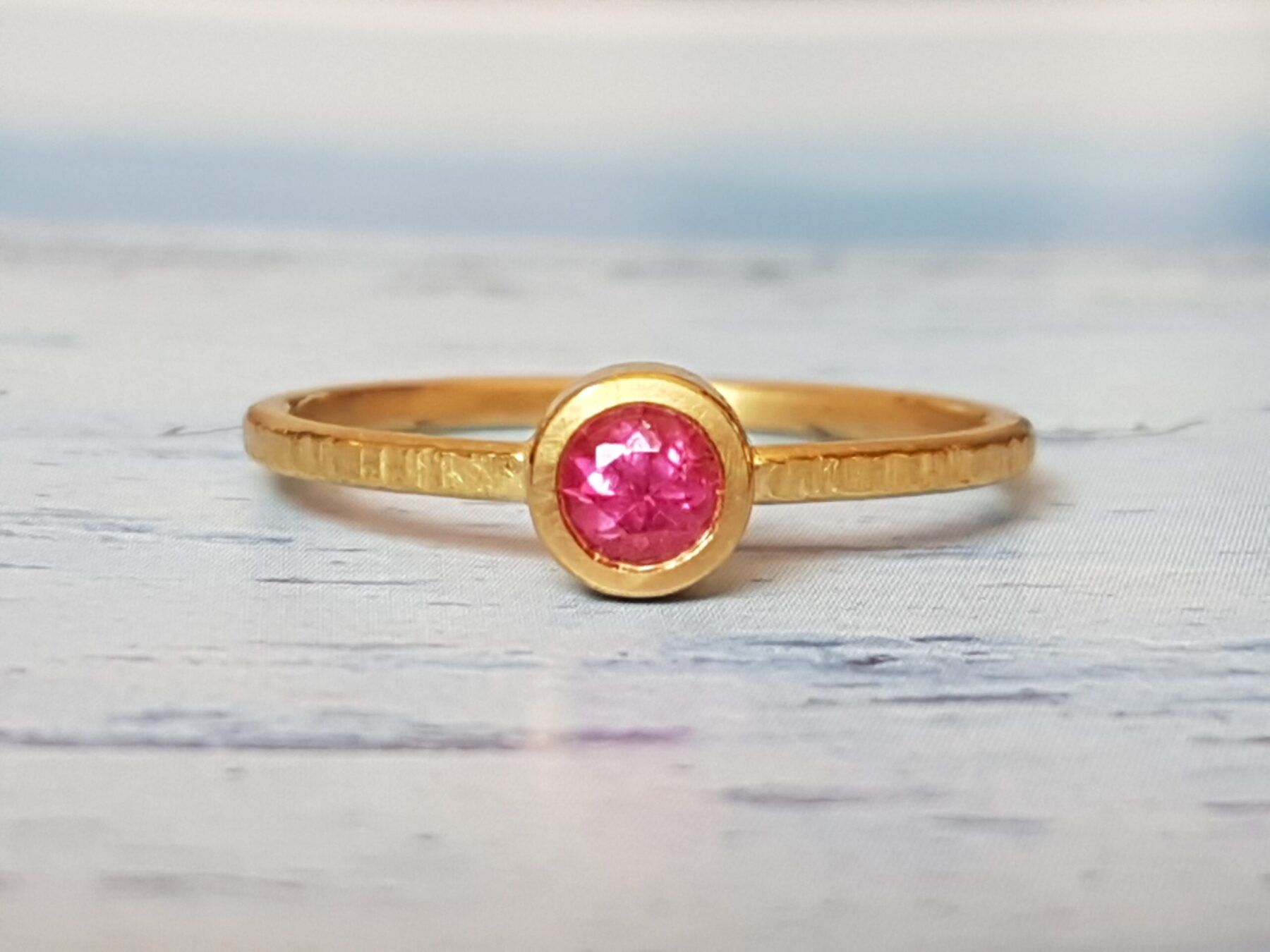 Ring 21.5 ct Fairmined gold with ethically sourced Ruby from Tanzania