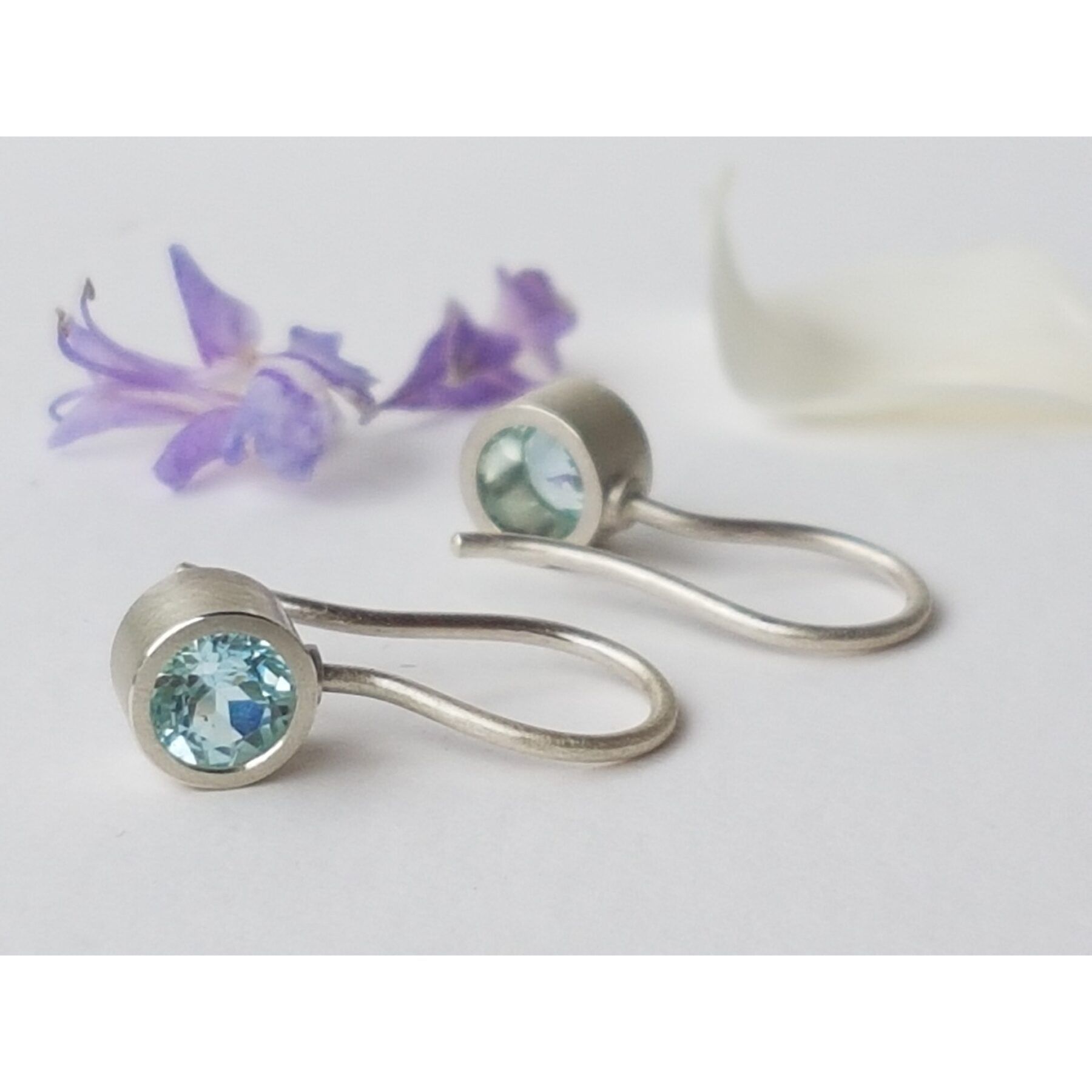 Silver earrings with topaz