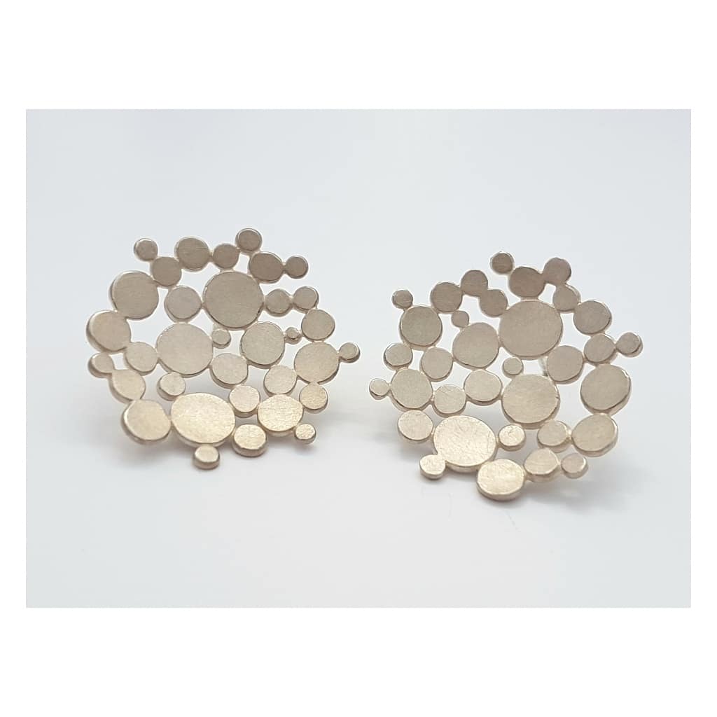 Big silver earrings